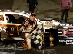 Nick Salva celebrates victory in the SK Light Modified feature Sunday at the New London-Waterford Speedbowl Super Bowl of Racing 