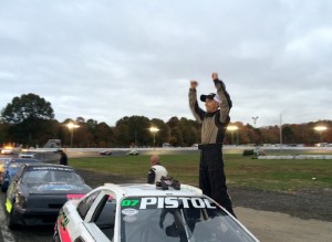 Pete Zaikarite celebrates victory in the Mini Stock feature Saturday at the New London-Waterford Speedbowl 