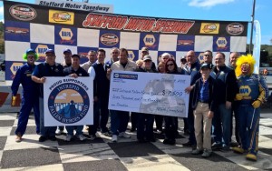 The check presentation made by NAPA and Stafford Motor Speedway to the Intrepid Fallen Heroes Fund at the NAPA Fall Final at Stafford  
