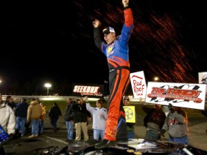Woody Pitkat celebrates victory in the Tri-Track Open Modified Series main event Sunday at the New London-Waterford Speedbowl's Bemers Super Bowl of Racing