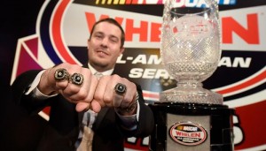 Lee Pulliam shows off his NASCAR Whelen All-American Series national championship rings (Photo: Jared C. Tilton/Getty Images for NASCAR)