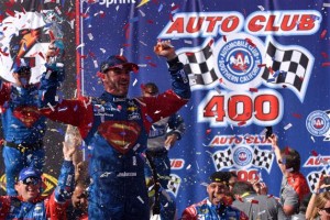 Jimmie Johnson celebrates victory after the Sprint Cup Series Auto Club 400 at Auto Club Speedway Sunday (Jonathan Moore/Getty Images for NASCAR) 