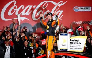 Martin Truex Jr. celebrates winning the Sprint Cup Series Coca-Cola 600 at Charlotte Motor Speedway Sunday (Photo: Todd Warshaw/Getty Images for NASCAR)