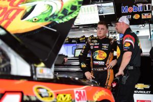 Ty Dillon (left) talks to crew chief Mike Bugarewicz during practice for the Sprint Cup Series GEICO 500 at Talladega Superspeedway on Friday (Photo by Matt Sullivan/Getty Images for NASCAR)