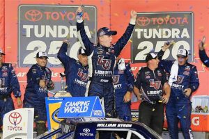 William Byron celebrates after winning the Camping World Truck Series Toyota Tundra 250 at Kansas Speedway Friday (Photo: Jerry Markland/Getty Images for NASCAR) 