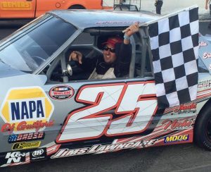 Charles Canfield celebrates victory in the Mini Stock division Saturday at the New London-Waterford Speedbowl (Photo: New London-Waterford Speedbowl) 