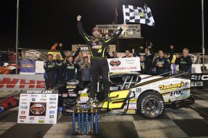 Doug Coby celebrates victory in the Whelen Modified Tour TSI Harley-Davidson 125 Friday at Stafford Motor Speedway (Photo: Adam Glanzman/Getty Images for NASCAR) 