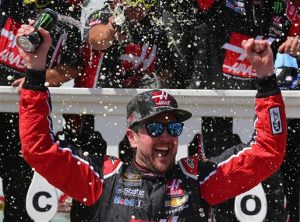 Kurt Busch celebrates following his win in the Sprint Cup Series Axalta "We Paint Winners" 400 at Pocono Raceway on Monday (Photo: Sarah Crabill/Getty Images for NASCAR) 