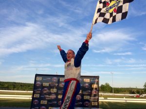 Phil Jacques celebrates his first career Limited Sportsman victory Wednesday at Thompson Speedway 