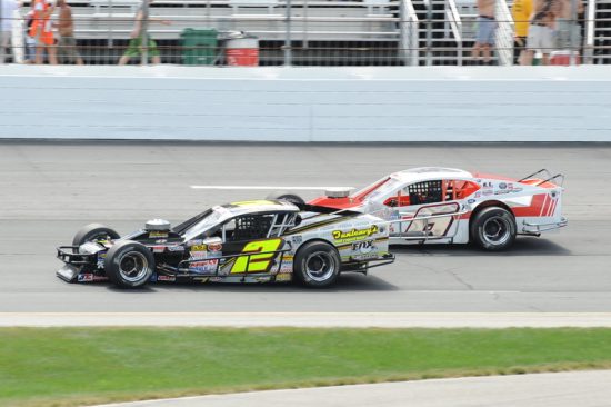 Doug Coby (2) and Ryan Preece (6) battle for position Saturday at NHMS 