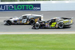 Donny Lia (8) and Doug Coby (2) race for the lead Saturday at NHMS (Photo: Fran Lawlor) 
