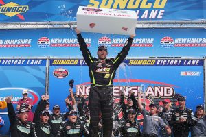 Doug Coby celebrates victory in the Whelen Modified Tour New England 100 last month at New Hampshire Moor Speedway. (Photo: Sarah Crabill/Getty Images for NASCAR)