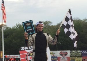 Jacob Perry (with checkered flag) celebrates his first career Mini Stock victory Saturday at the New London-Waterford Speedbowl (Photo: New London-Waterford Speedbowl) 