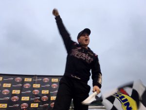 Tony Membrino Jr. celebrates victory in Saturday's SK Light Modified feature at Thompson Speedway 