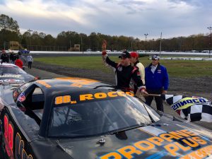 Keith Rocco celebrates a Late Model victory and division championship Saturday at the New London-Waterford Speedbowl 