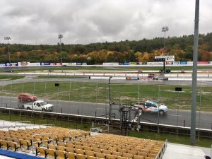 Crews work to dry the track Sunday afternoon at Stafford Speedway 