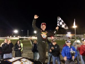 Ted Christopher celebrates victory in the SK Modified feature Sunday at the New London-Waterford Speedbowl 