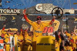 Joey Logano celebrates following victory in the Sprint Cup Series Can-Am 500 at Phoenix International Raceway Sunday (Photo: Robert Laberge/Getty Images for NASCAR) 